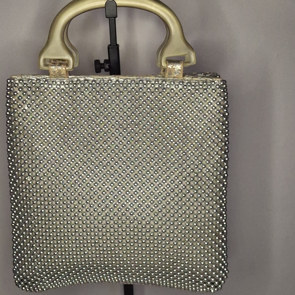 Elegant Silver Beaded Clutch with Gold Handle